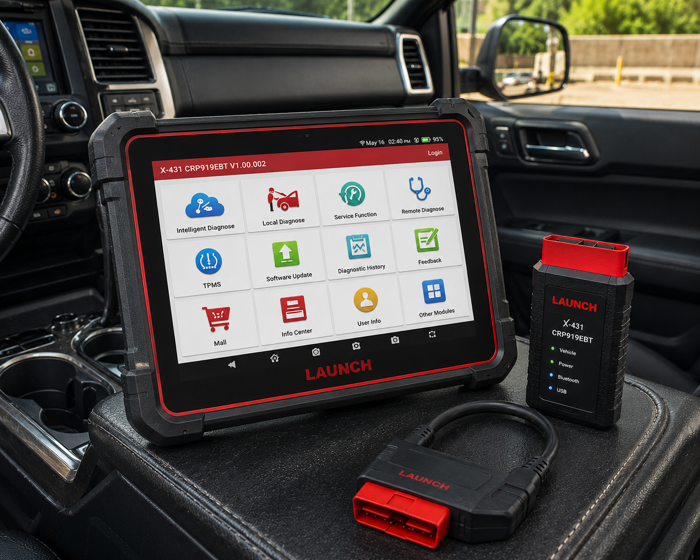 Launch X431 CRP919EBT tablet scanner with its Bluetooth VCI dongle inside a truck
