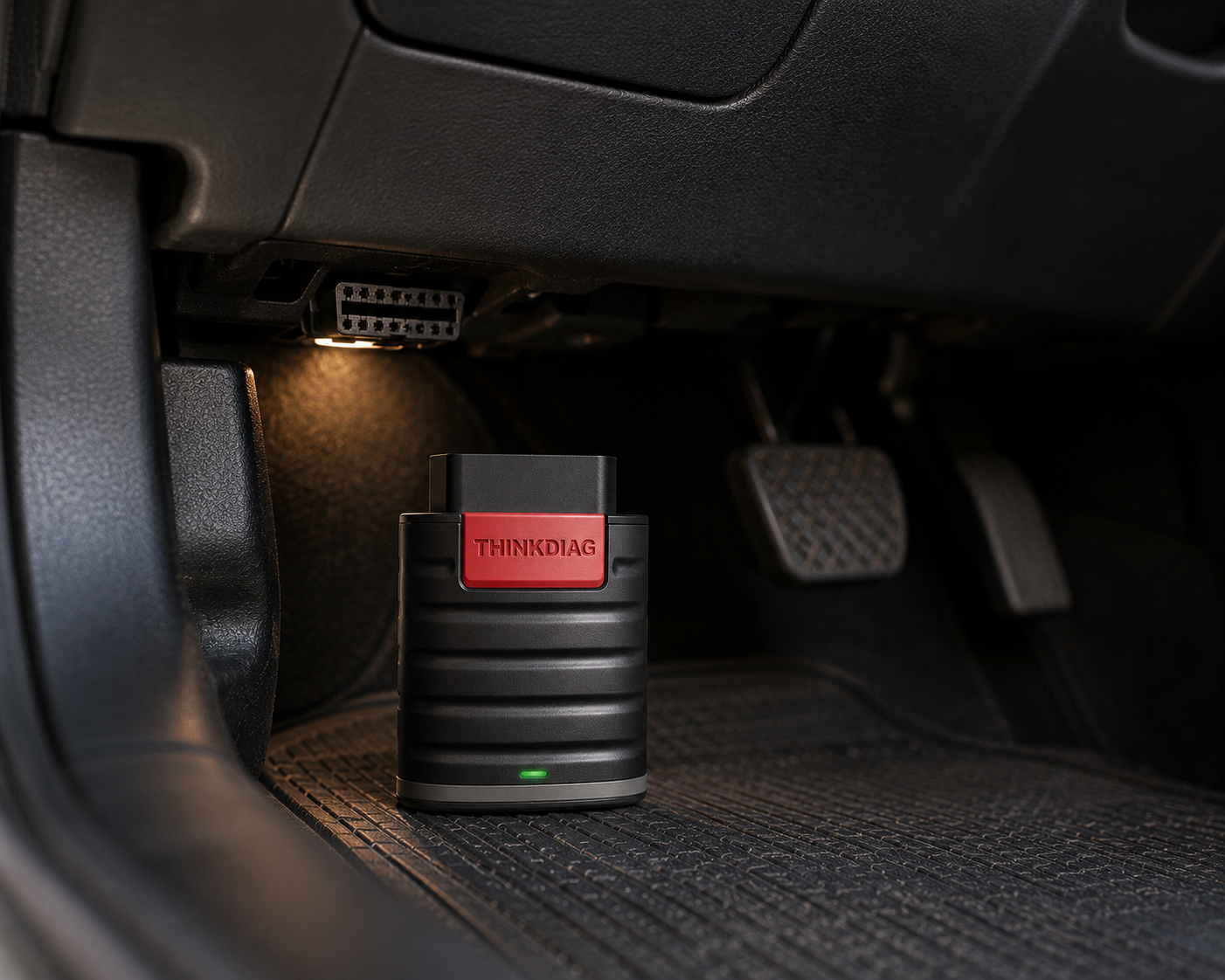 Thinkcar THINKDIAG Bluetooth diagnostic dongle plugged into a vehicle's OBD-II port