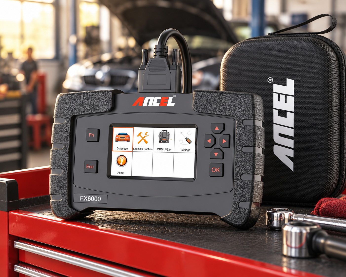 ANCEL FX6000 automotive diagnostic scanner on a red mechanic tool cart in a professional workshop