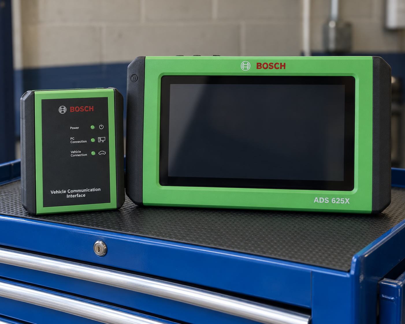 Bosch ADS 625X diagnostic tablet with wireless VCI on a blue mechanic tool cart in a workshop