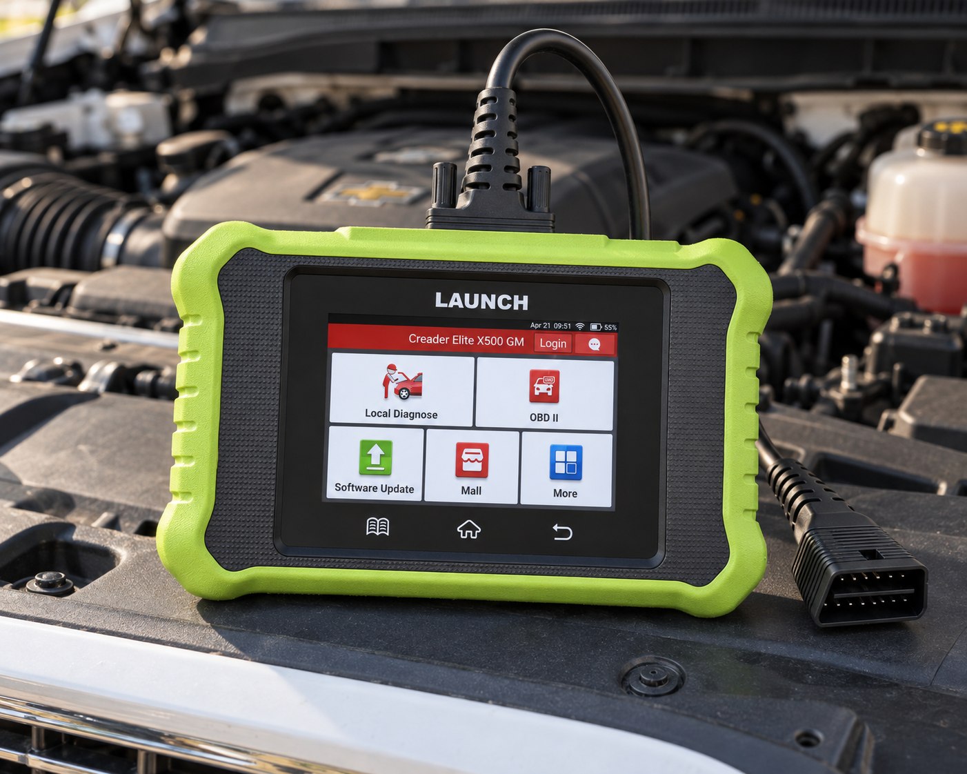 LAUNCH Creader Elite X500 GM diagnostic scanner in the engine bay of a white pickup truck