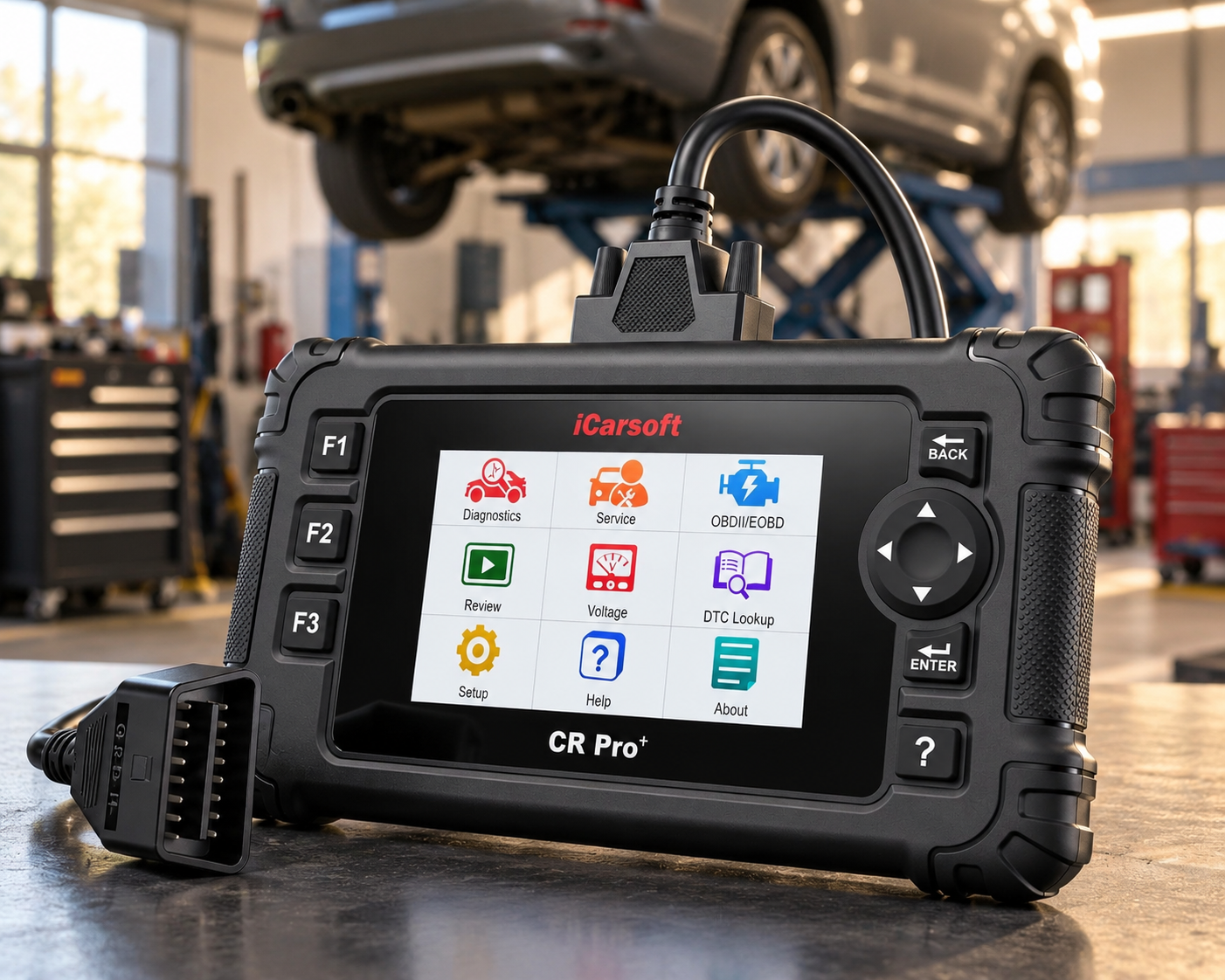 iCarsoft CR Pro Plus diagnostic scanner in a professional workshop with a car on a scissor lift